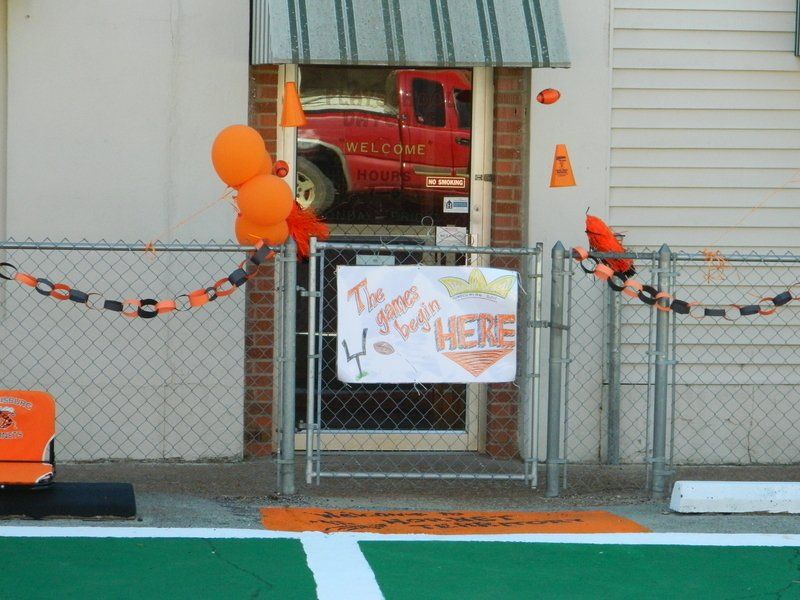 A fence with a sign that says 