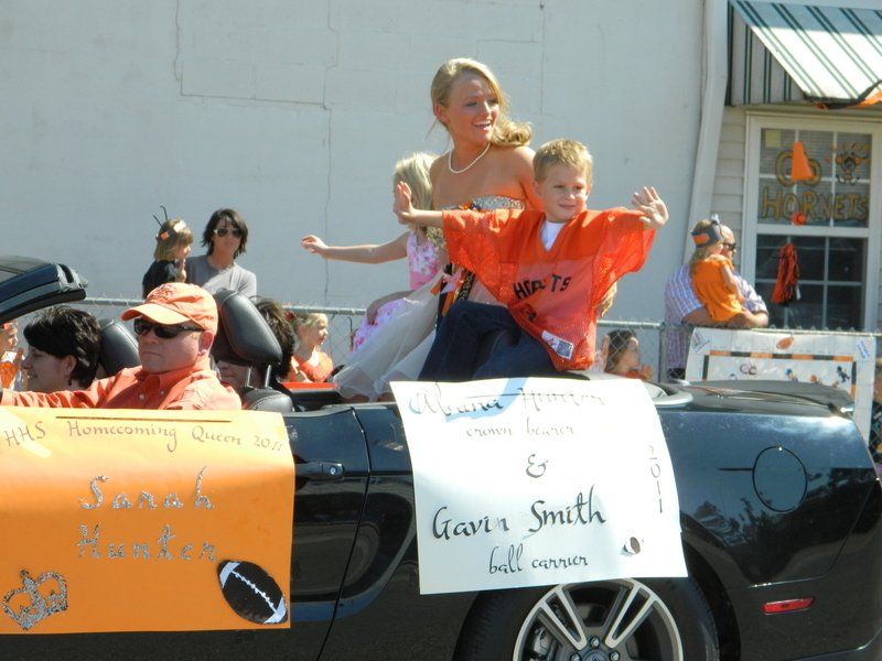 A parade with a sign that says gavin smith on it