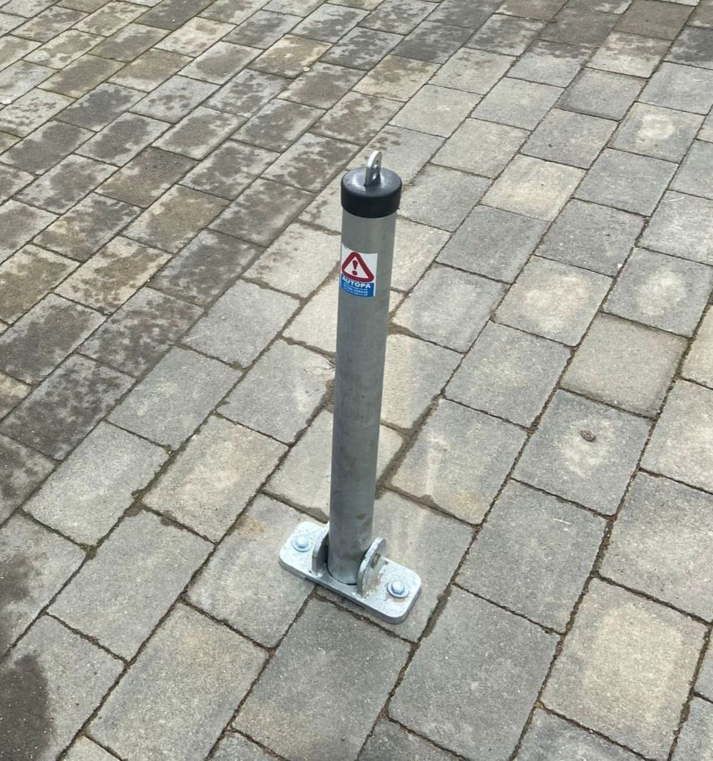 Professional Autopa fold-down parking post installed on a driveway in Maidstone by The Key Locksmith to help secure a private parking space and improve driveway security.