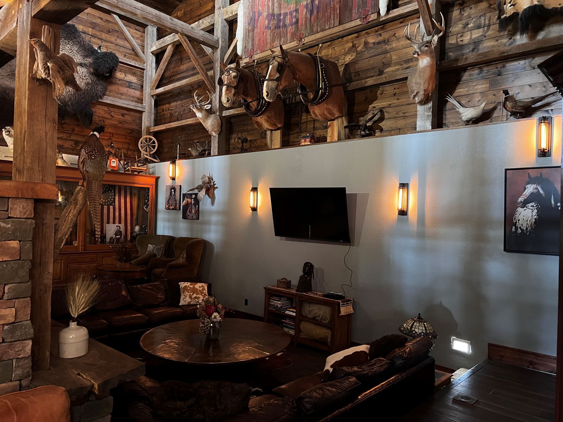A living room filled with furniture and a flat screen tv.
