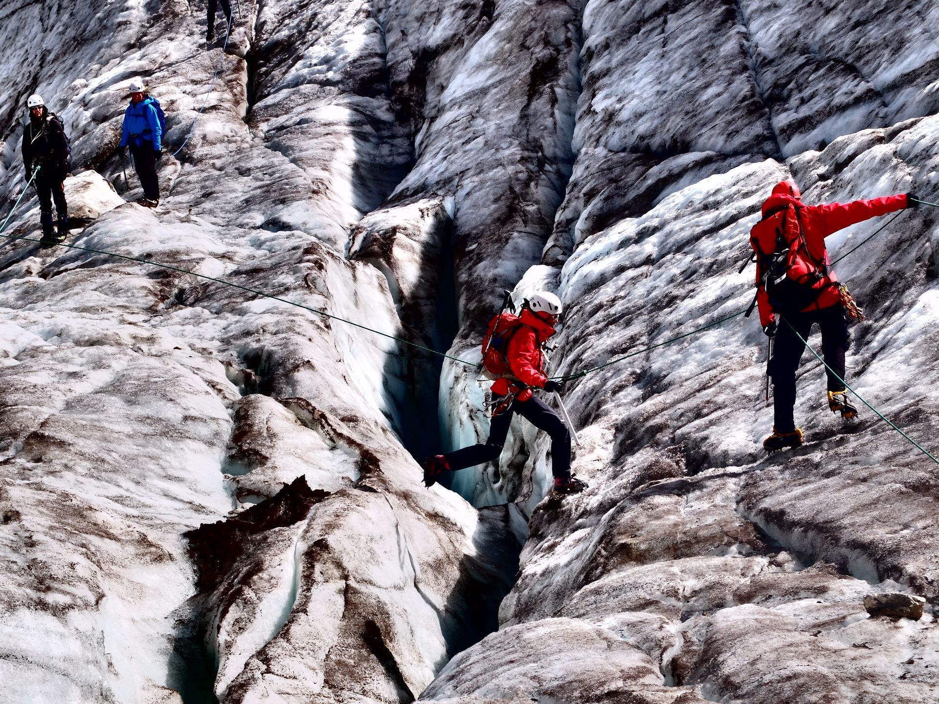 A group of young explorers learn climbing skills