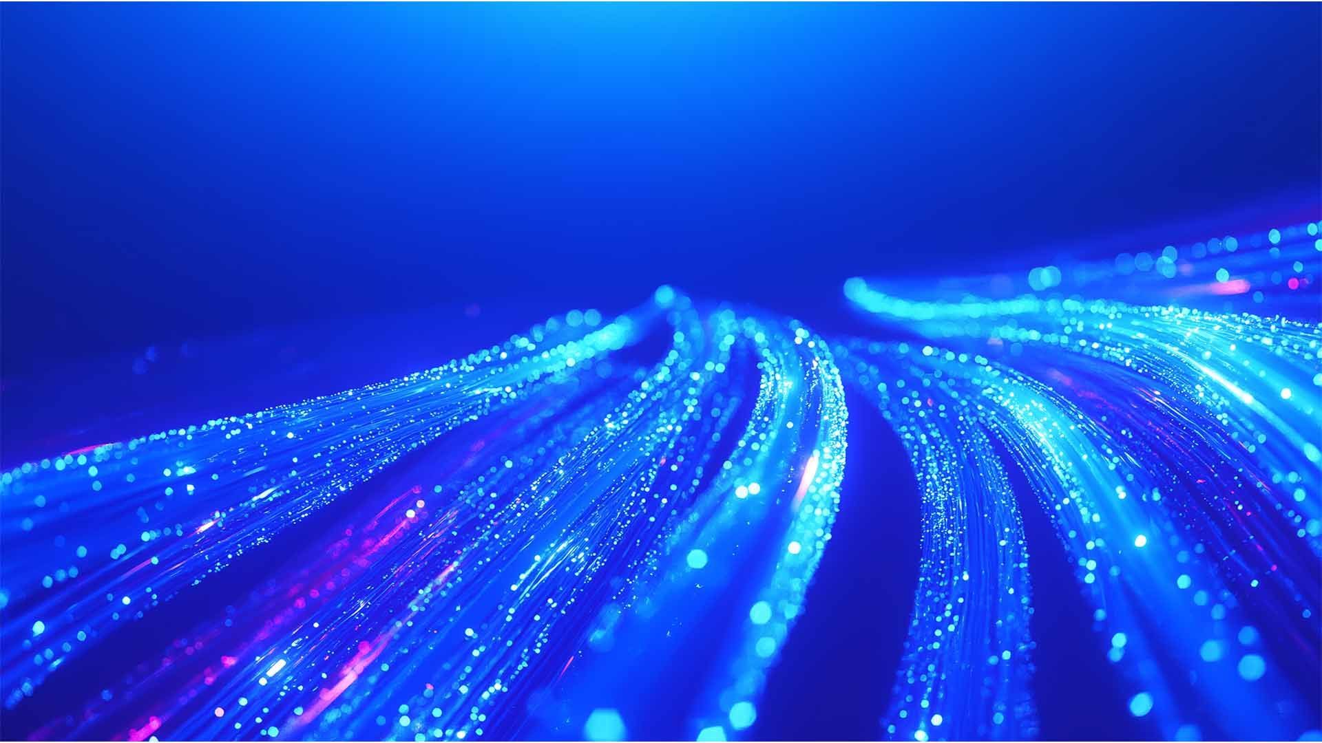 Subsea cables lit up with lights like neurons in the brain