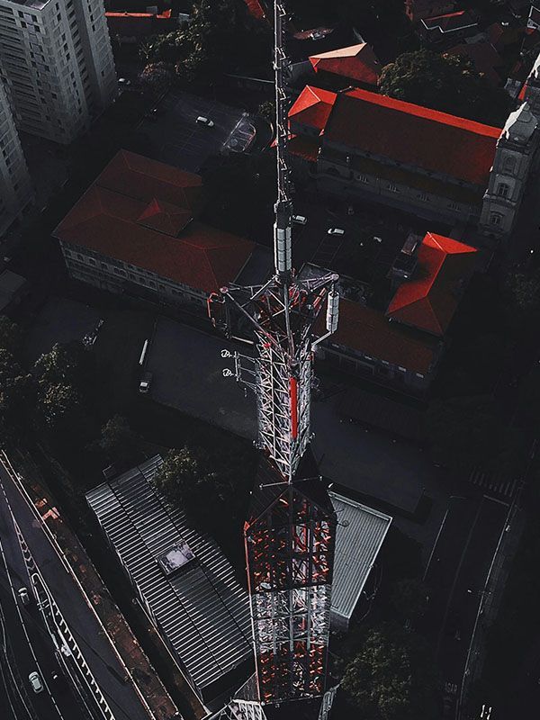 An imposing telecoms tower at dusk