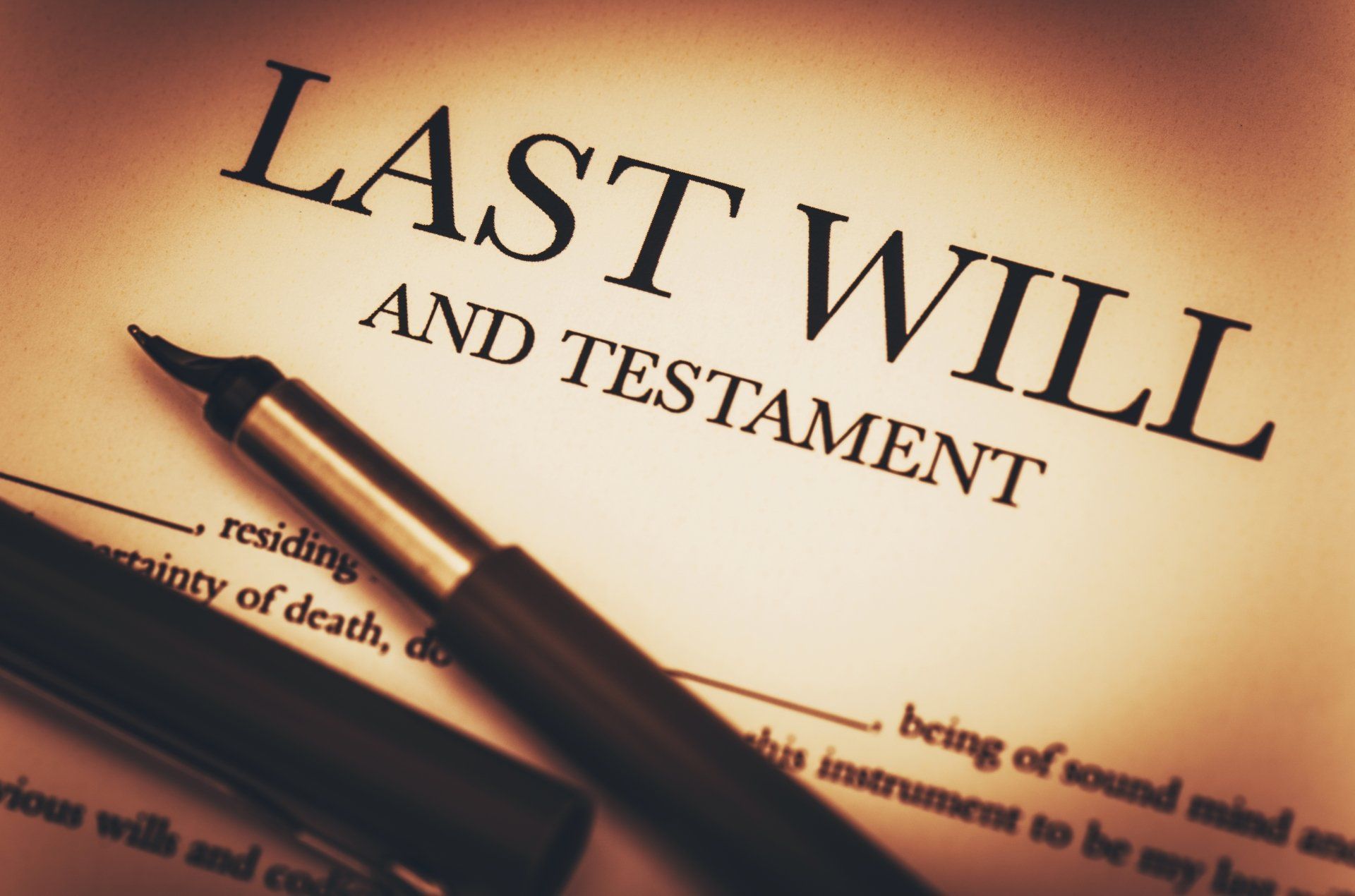 Last will and testament document with a fountain pen on top