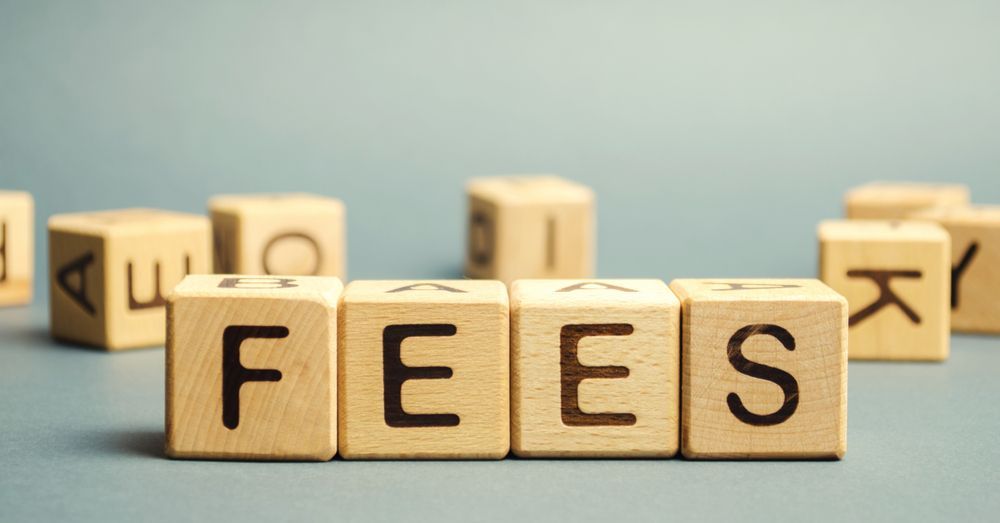 Wooden Blocks Spelling Fees on a Table — Psychology Practice In Tweed Heads, NSW