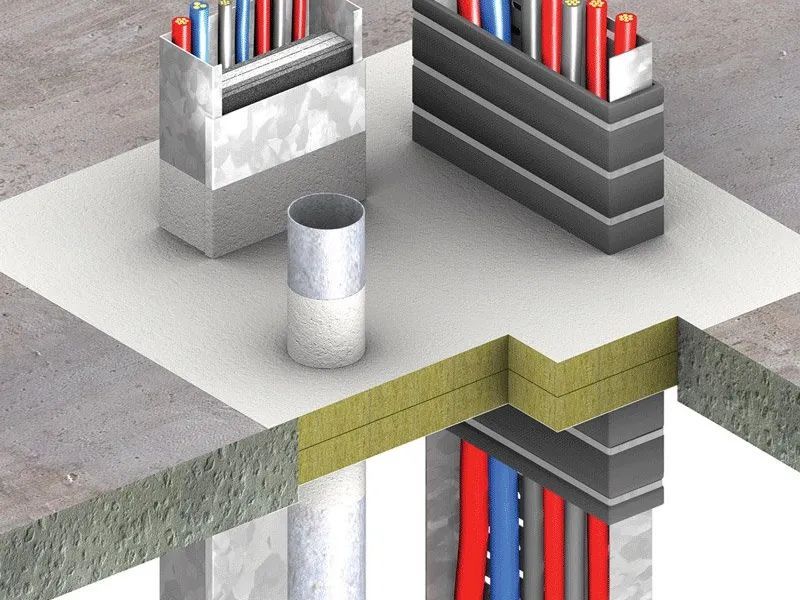 Diagram showing fire stopping installation for cables and pipes through a floor