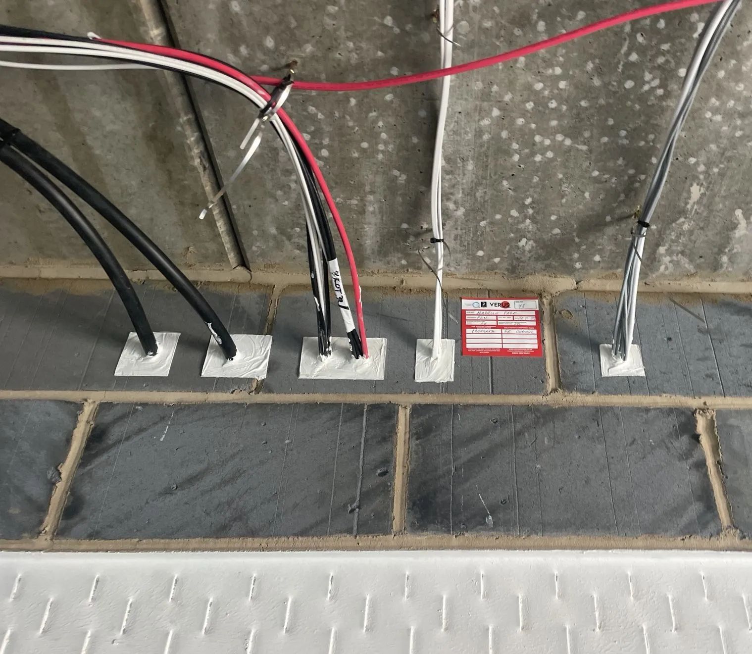 Verus Group fire-rated seals around individual cable penetrations