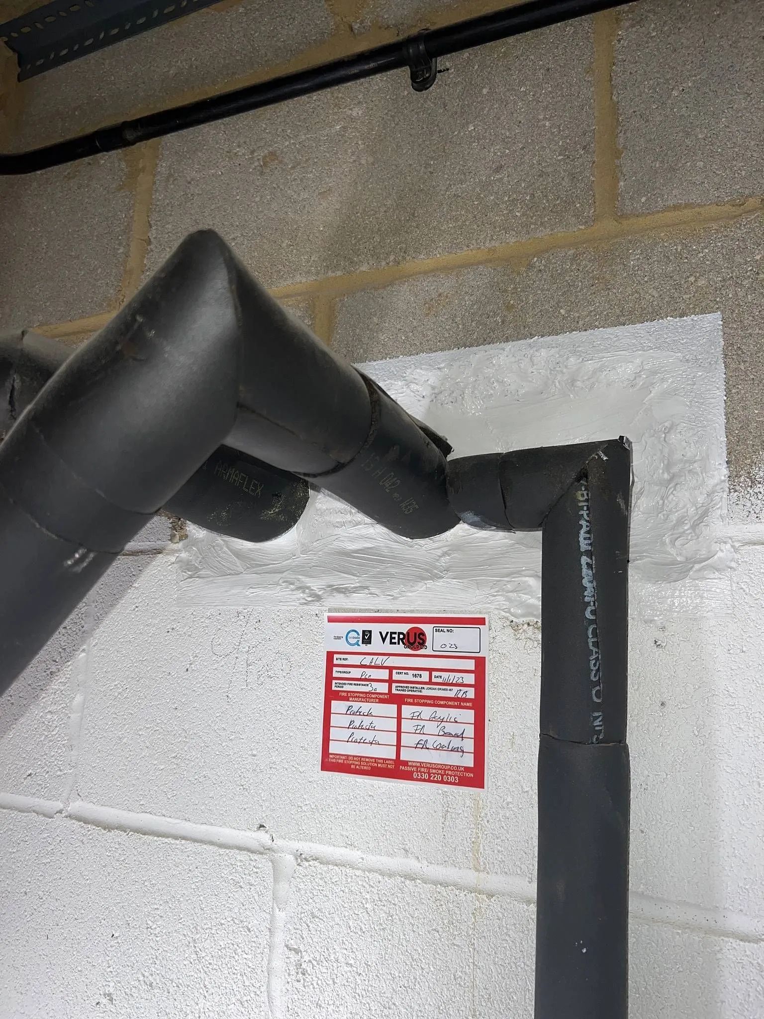 Verus Group fire stopping seal around pipework penetrating a wall