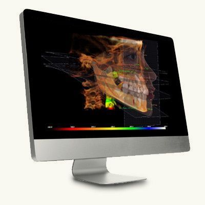 Desktop monitor displaying a colorful 3D scientific visualization on a black screen
