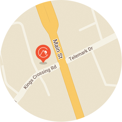 Map with a red location pin near Main St, Kings Crossing Rd, and Telemark Dr.