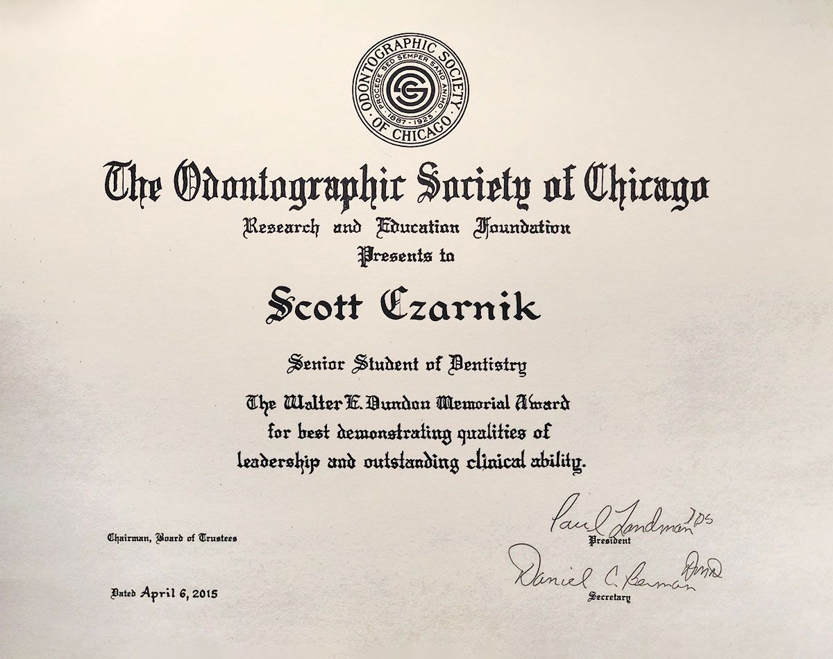 Certificate from The Columbian Society of Chicago honoring Scott Carroll with ornate black text on cream paper