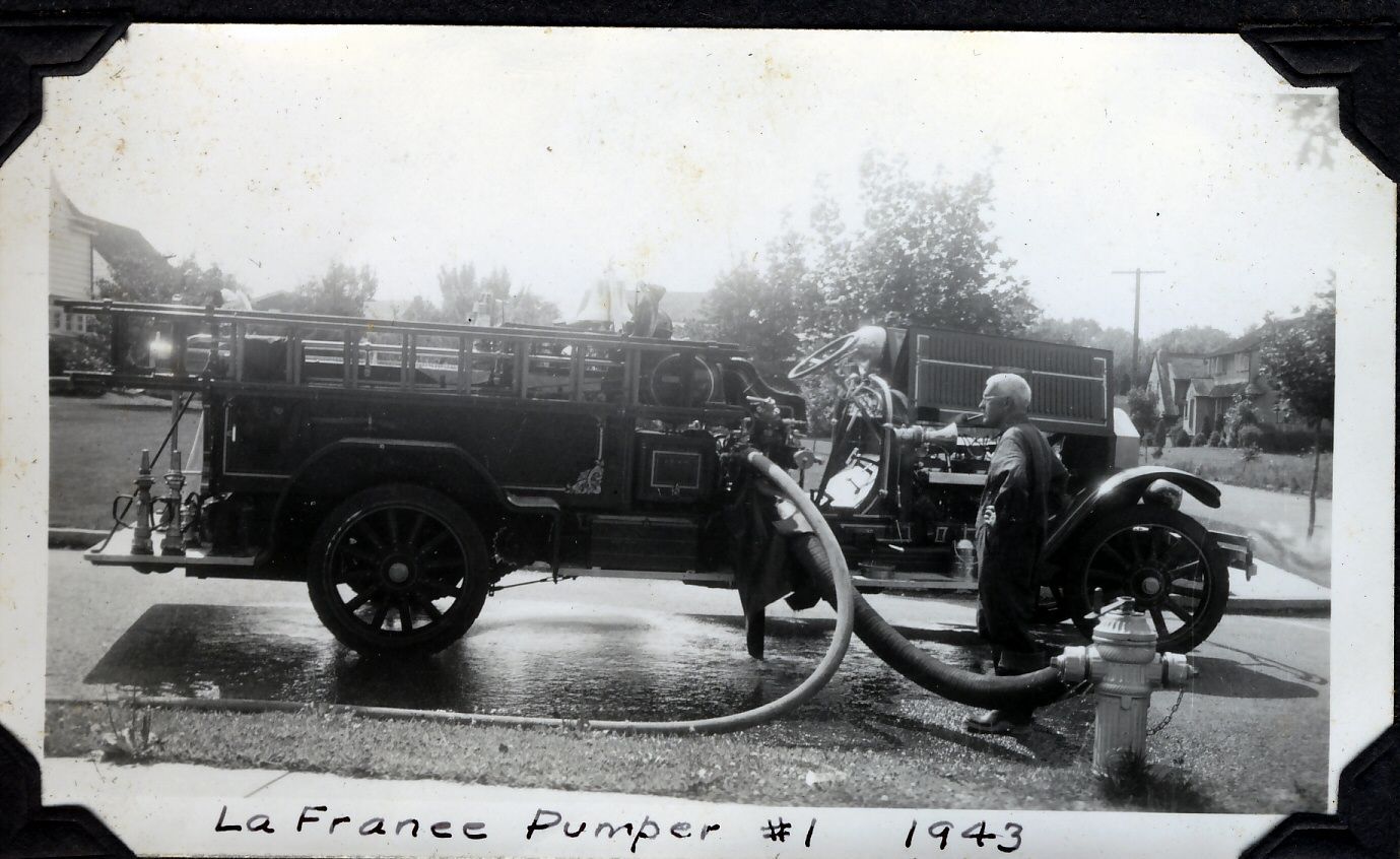 The American LaFrance pumper at a hydrant, 1943.