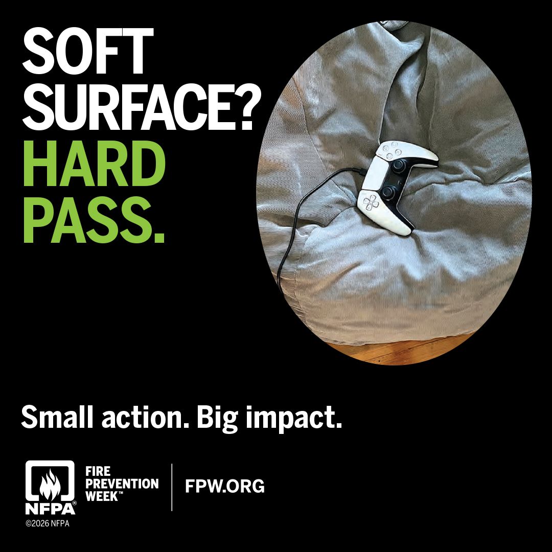 Soft surface? Hard pass. A game controller charging on a beanbag chair. Fire Prevention Week 2026, NFPA.