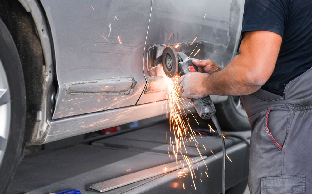 Repair Service Worker Fix Damaged Car — Panel Beaters in Mitchell, ACT