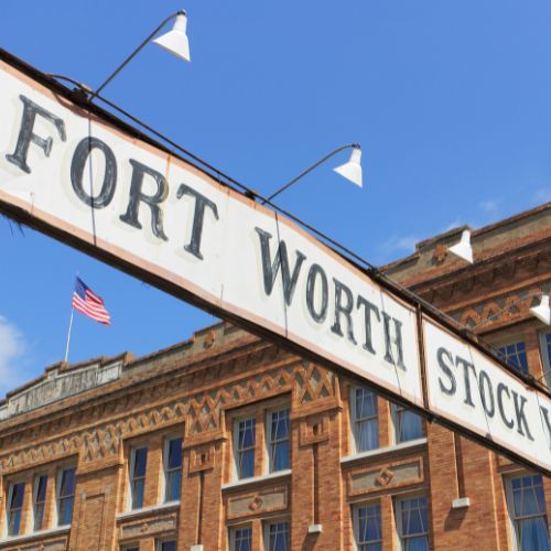 Overhead sign for Fort Worth Texas at Stockyards.