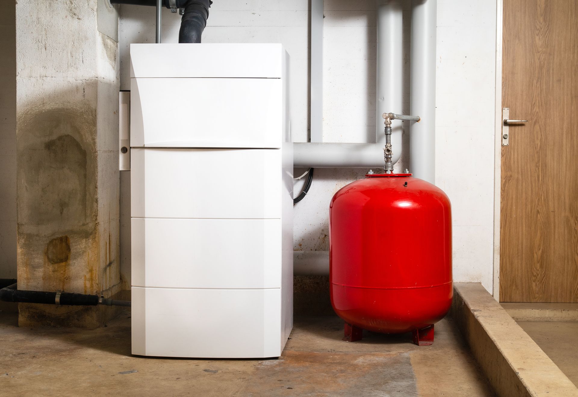 Hand cleaning an outdoor air conditioner unit with a spray bottle