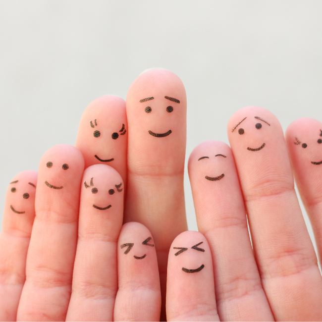 A Group Of Fingers With Faces Drawn On Them — Howells & Co Legal & Conveyancing In Cessnock, NSW
