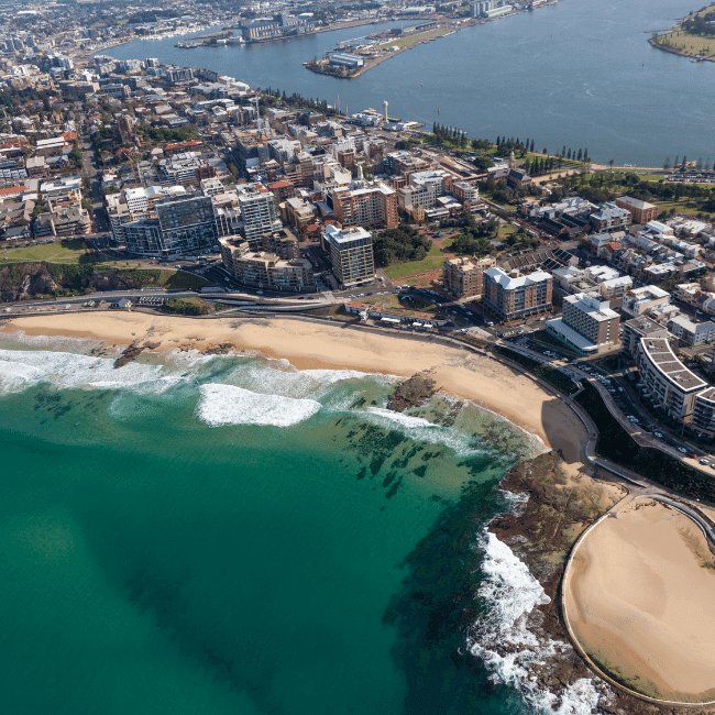 An Aerial View Of A City And A Body Of Water — Howells & Co Legal & Conveyancing In Cessnock, NSW