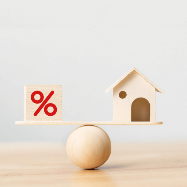A Scale With A House And A Percent Sign On It — Howells & Co Legal & Conveyancing In Cessnock, NSW