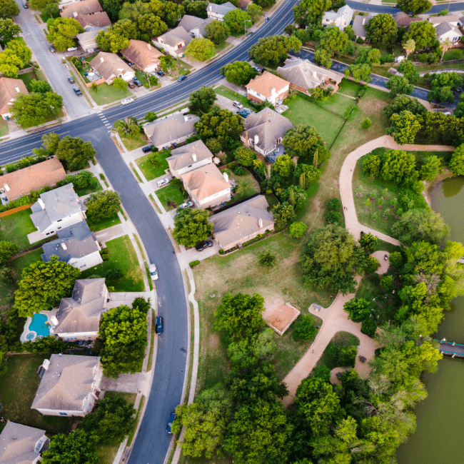 An Aerial View Of A Residential Area With Lots Of Trees And Houses — Howells & Co Legal & Conveyancing In Cessnock, NSW