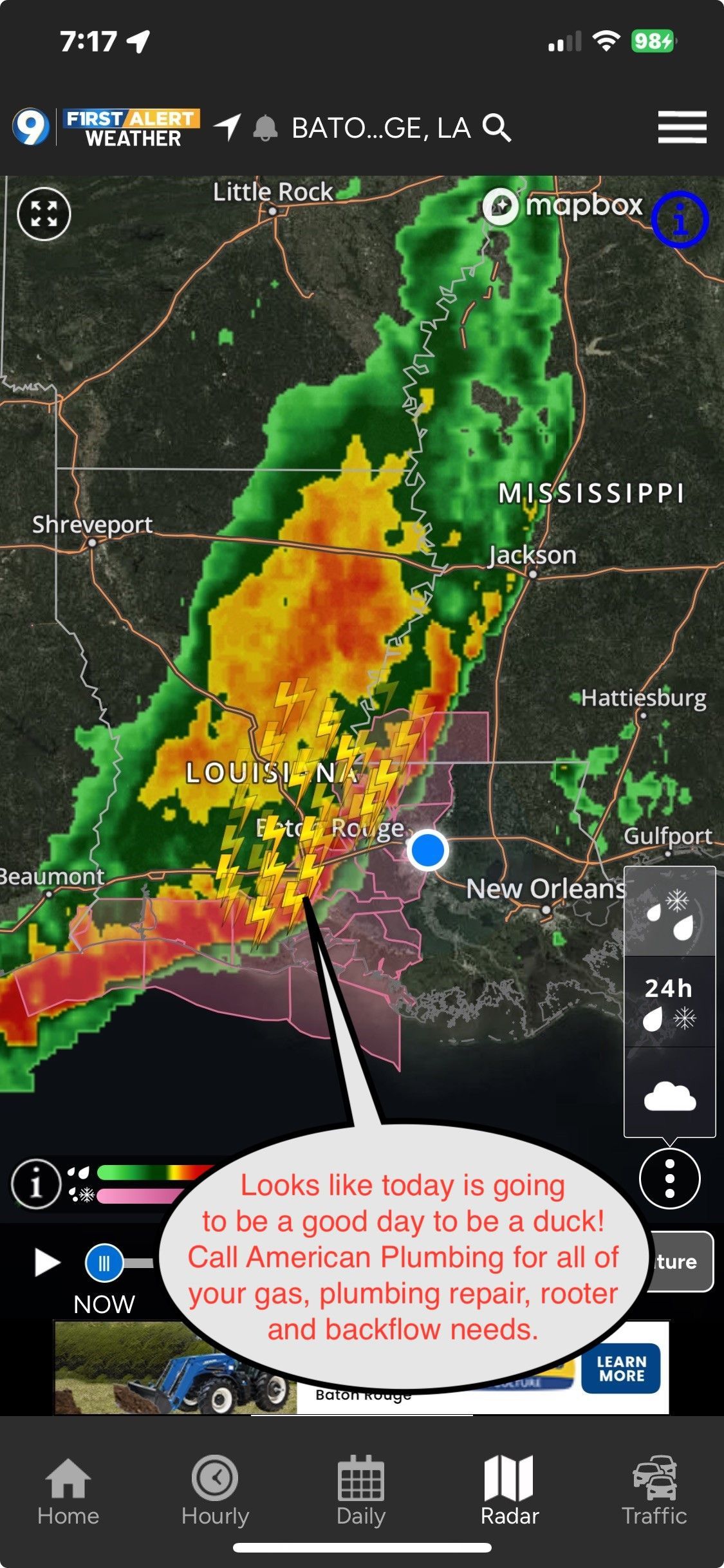 Weather radar map showing a yellow-orange storm band stretching diagonally across a region with a red alert box.