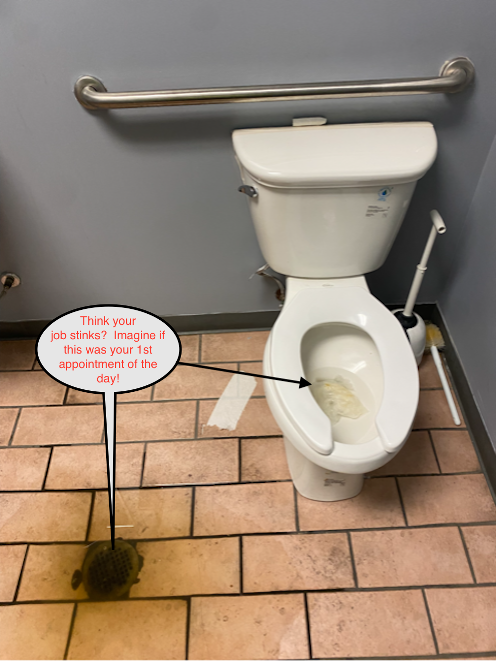A toilet in a public restroom with a speech bubble: