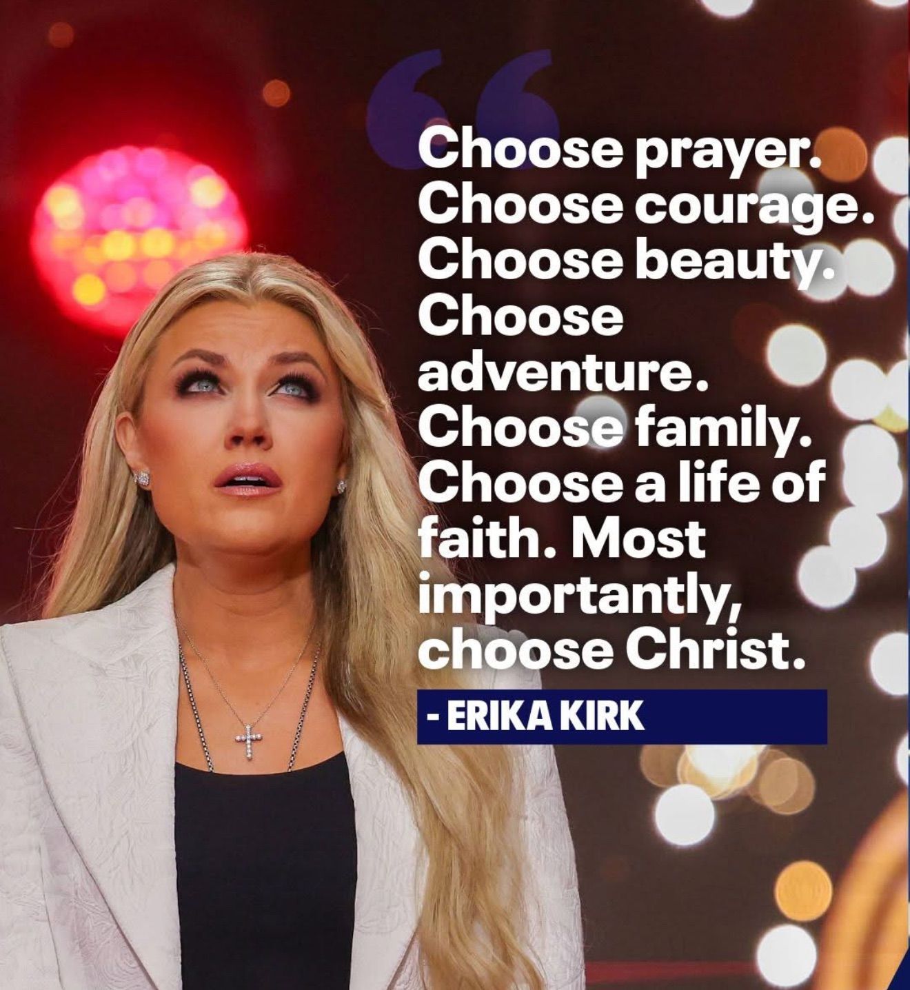 Woman on stage beside quote: “Choose prayer, courage, beauty, adventure, family, faith. Choose Christ.”
