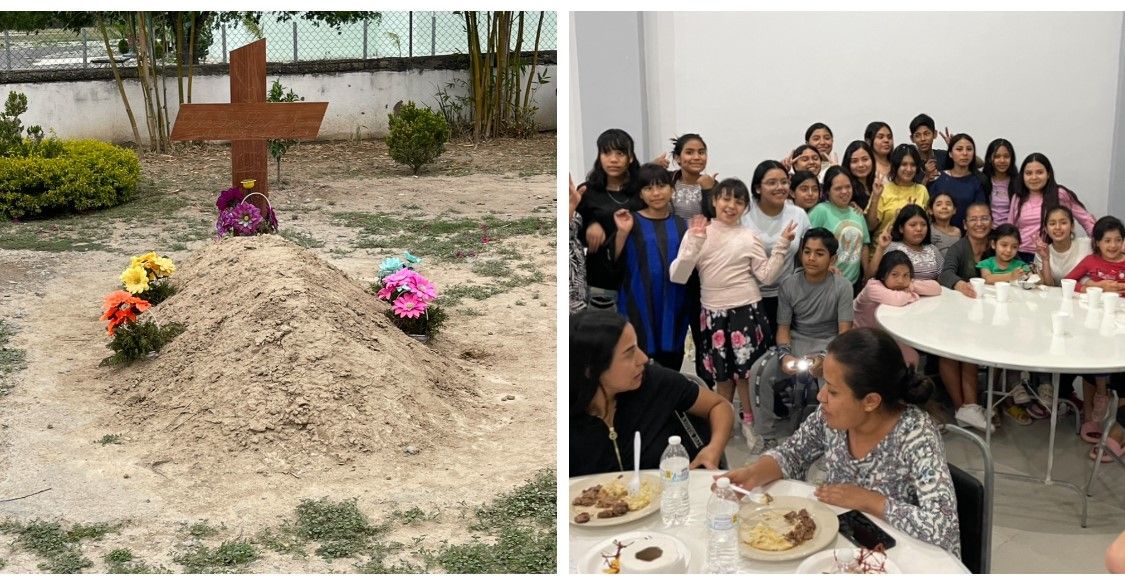 Grave with wooden cross, flowers. Group of people, children, eating and smiling at a table.