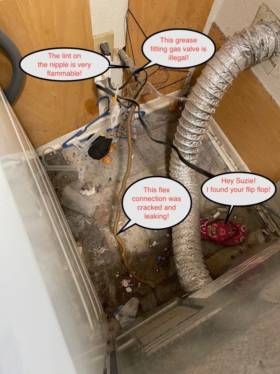 Dirty laundry/dryer area: cracked fitting, ducting, electrical wires, and a lot of debris.
