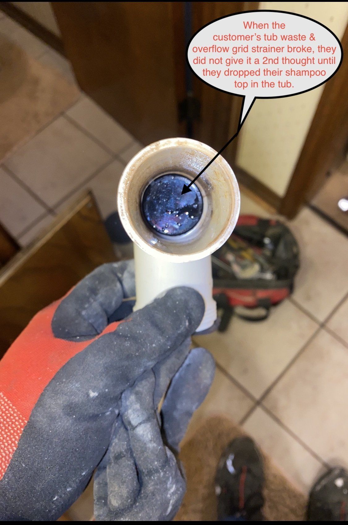 A gloved hand holding a dirty, white plumbing pipe with a dark, liquid substance inside; quote bubble notes someone didn't provide a top for it.