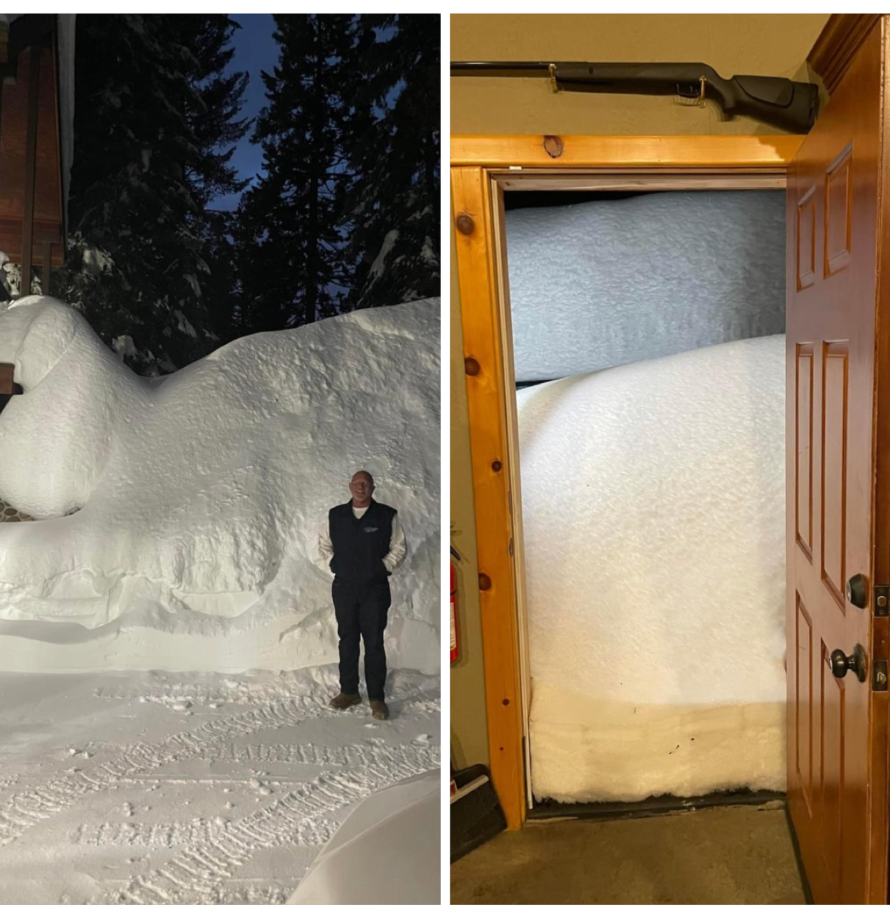 Snow piled high outside a home, blocking the door, with a person standing beside it at night.