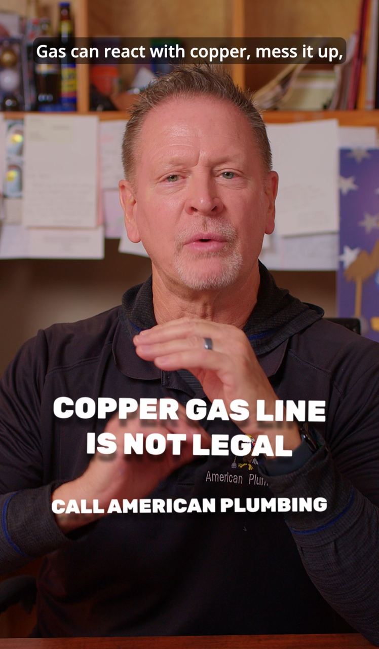 Man speaking in a home, with text warning: “Copper gas line is not legal. Call American Plumbing.”