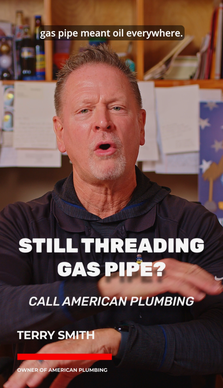 Man speaking in an office with text: “Still threading gas pipe?” and “Call American Plumbing.”