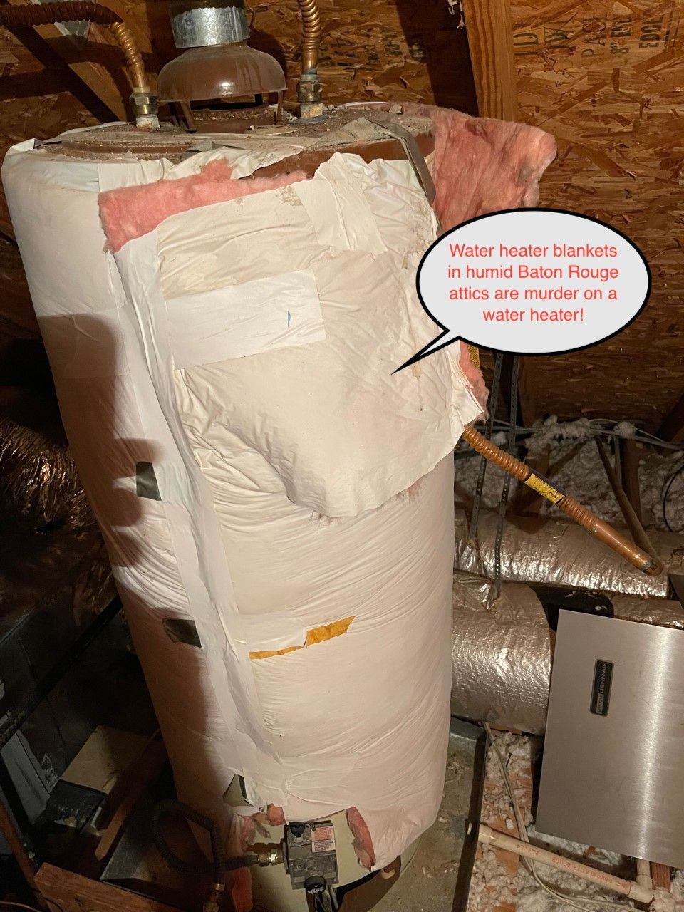 Water heater in attic, damaged insulation.