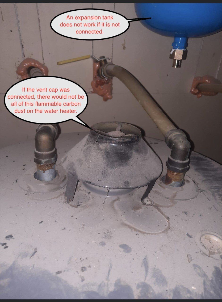 Water heater with annotations showing disconnected pipes and lack of flammable vapor control.