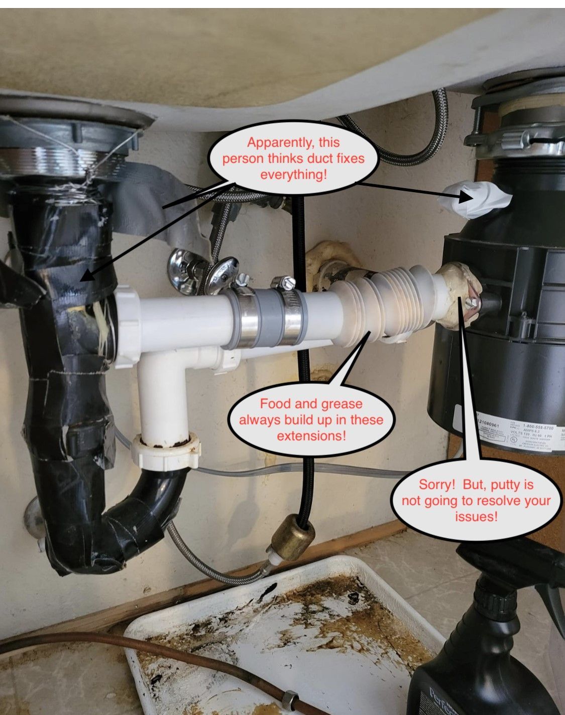 Under-sink plumbing with pipes and handwritten callouts pointing out leaks and corrosion.