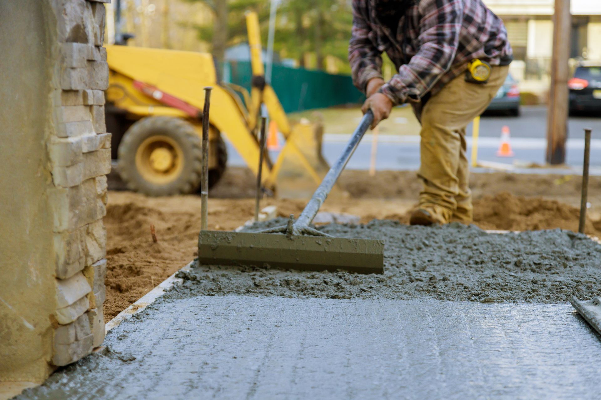 A Man Is Spreading Concrete On A Sidewalk - Columbus, IN - Orville K. Fleetwood Asphalt A Man Is Spreading Concrete On A Sidewalk - Columbus, IN - Orville K. Fleetwood Asphalt