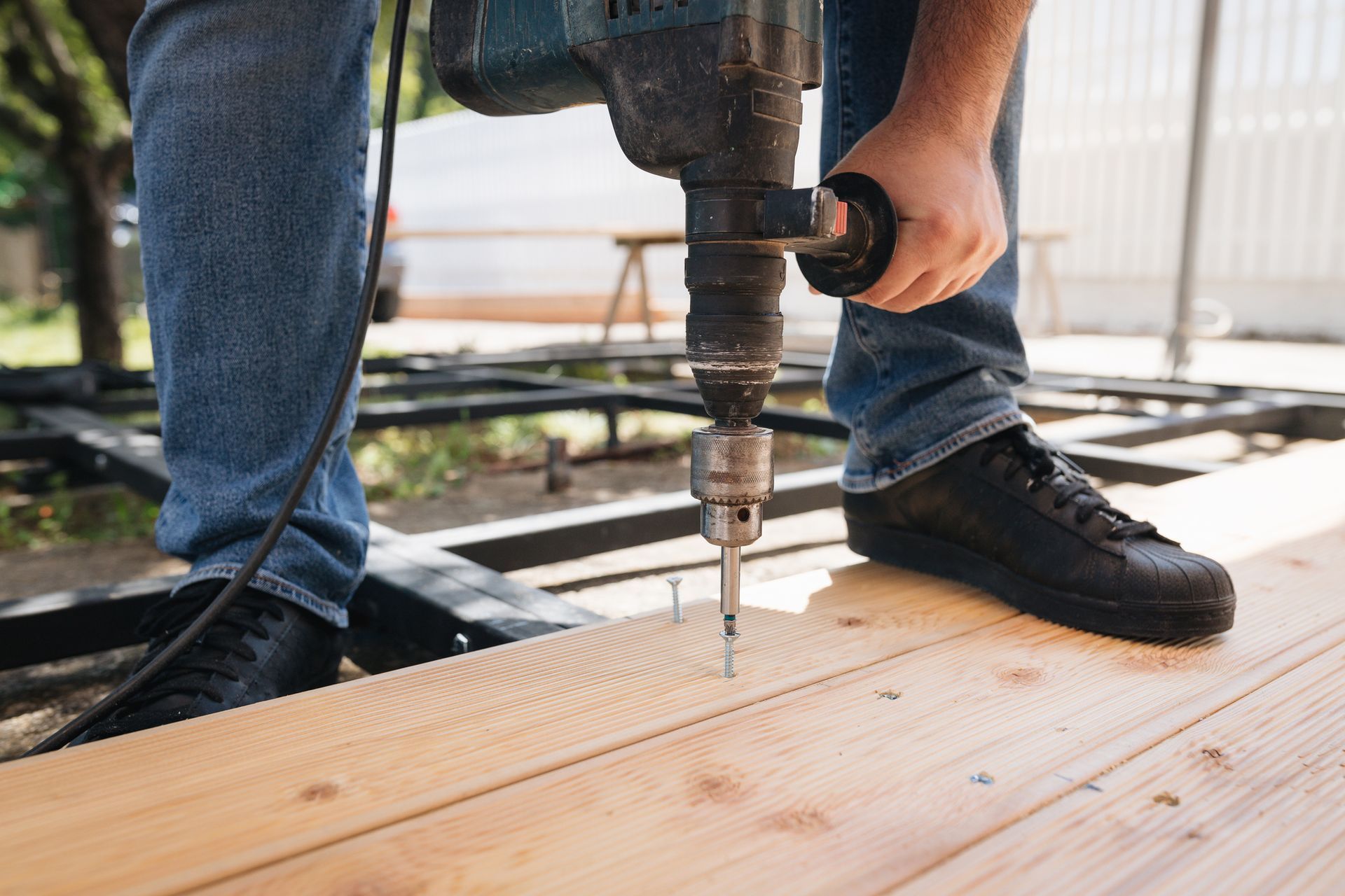 A Man Is Using A Drill - Columbus, IN - Orville K. Fleetwood Asphalt A Man Is Using A Drill - Columbus, IN - Orville K. Fleetwood Asphalt