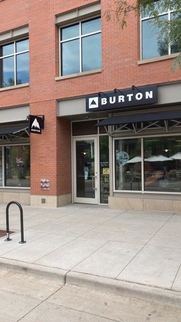 A burton store is located in a brick building