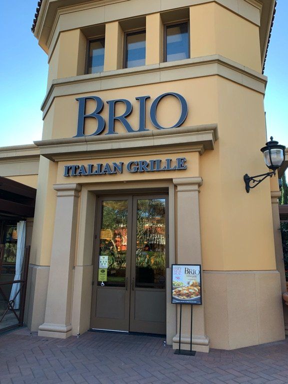A building with a sign that says brio italian grille