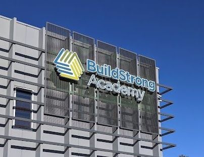 A building with a sign that says leadership academy