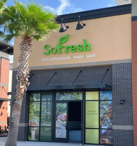 The front of a restaurant called sofresh chef crafted bowls wraps salad