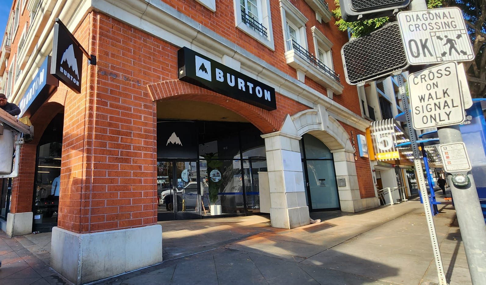 A brick building with a sign that says burton on it