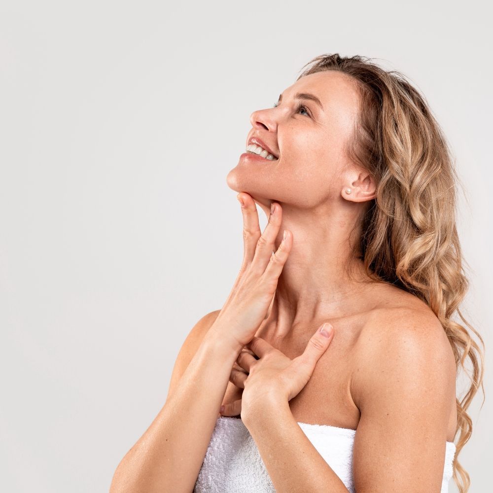 A woman with a smooth, well defined neck contour
