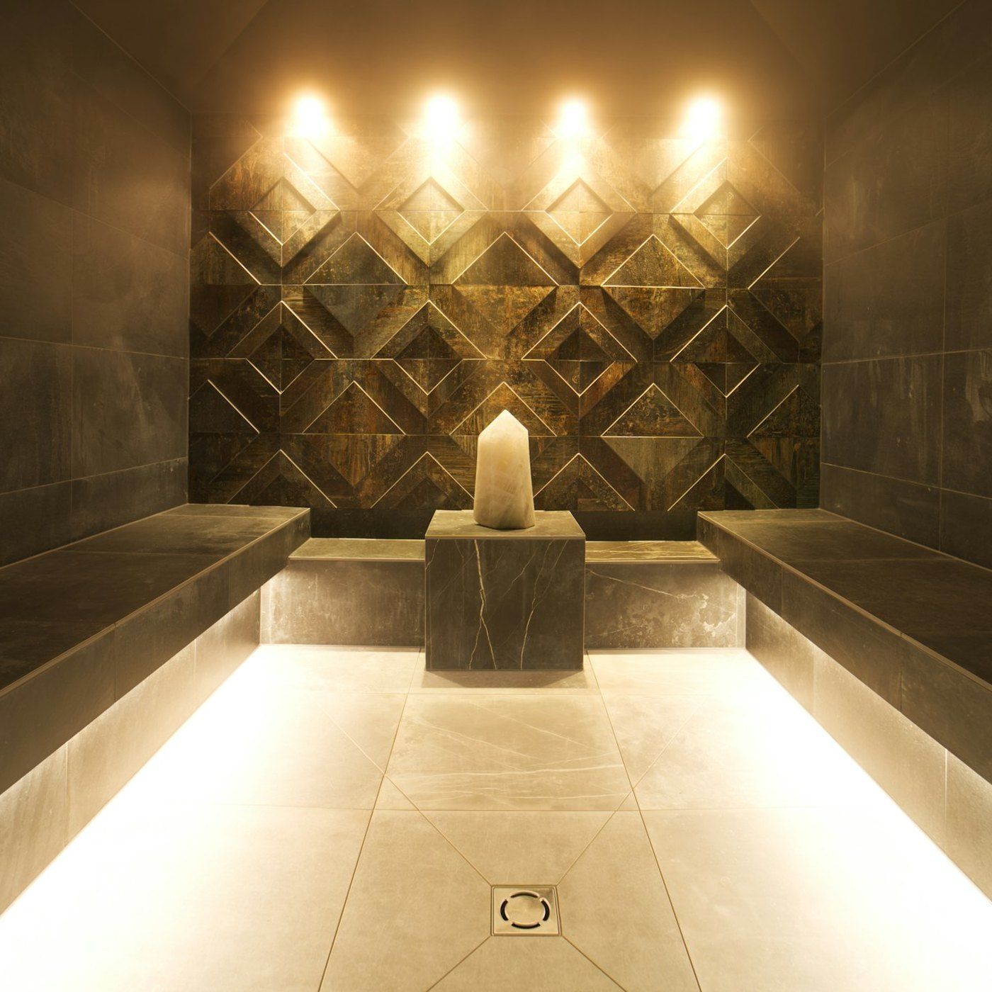 Warm, softly lit stone, part of the Aevum visual language