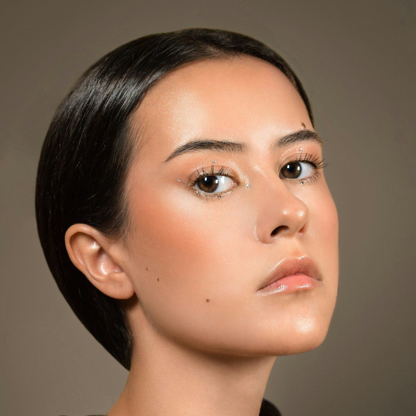 A beauty model with balanced midface volume and clear skin