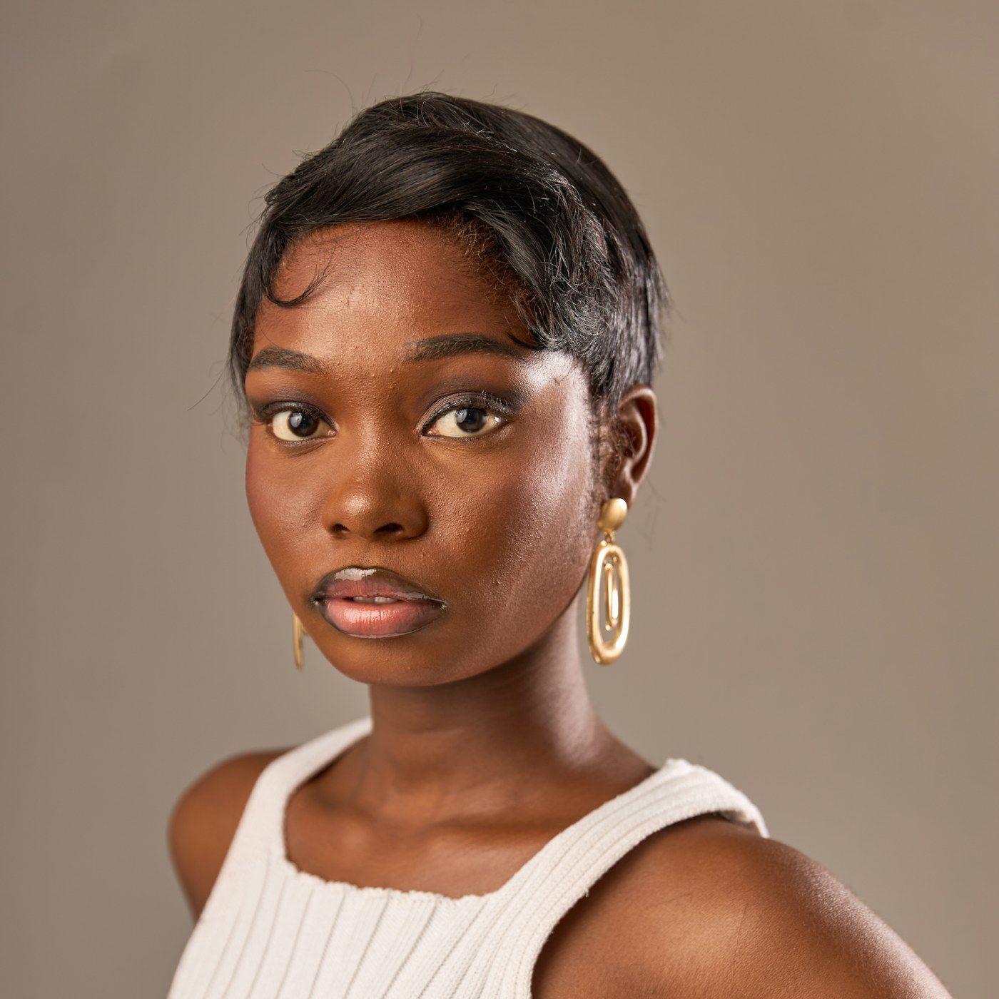Smooth, clear skin on a beauty model in soft studio light