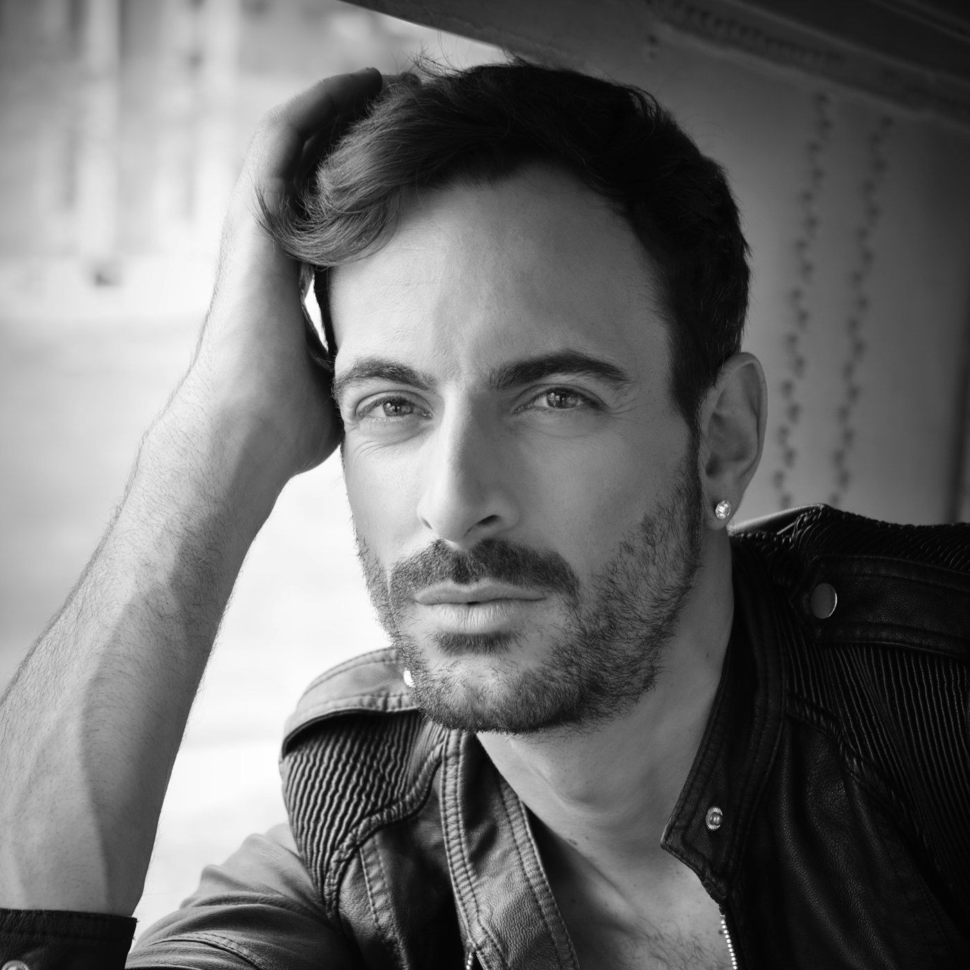 A composed portrait in a private consultation setting