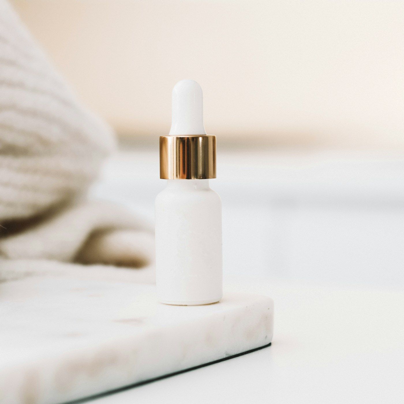 A calm studio portrait with fresh, healthy skin quality