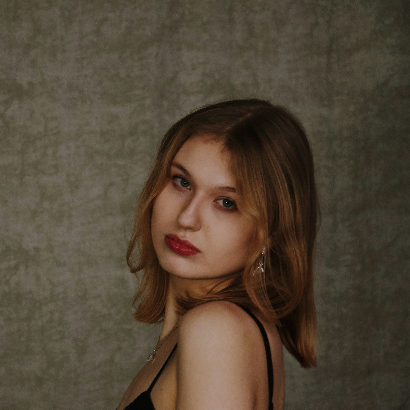 A composed portrait during an ongoing program